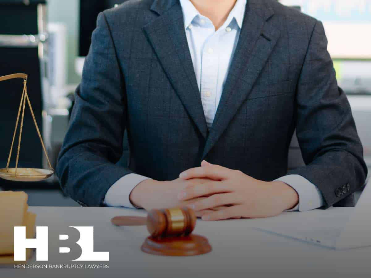 Attorney assisting with strategies for a debt-free new year, offering guidance on recovering from holiday spending and financial planning