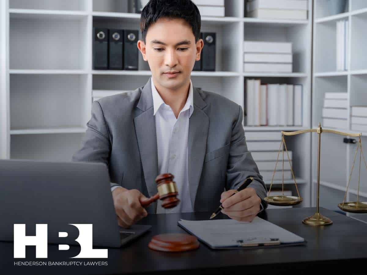 Chapter 13 Bankruptcy consultation with Henderson attorney reviewing legal documents